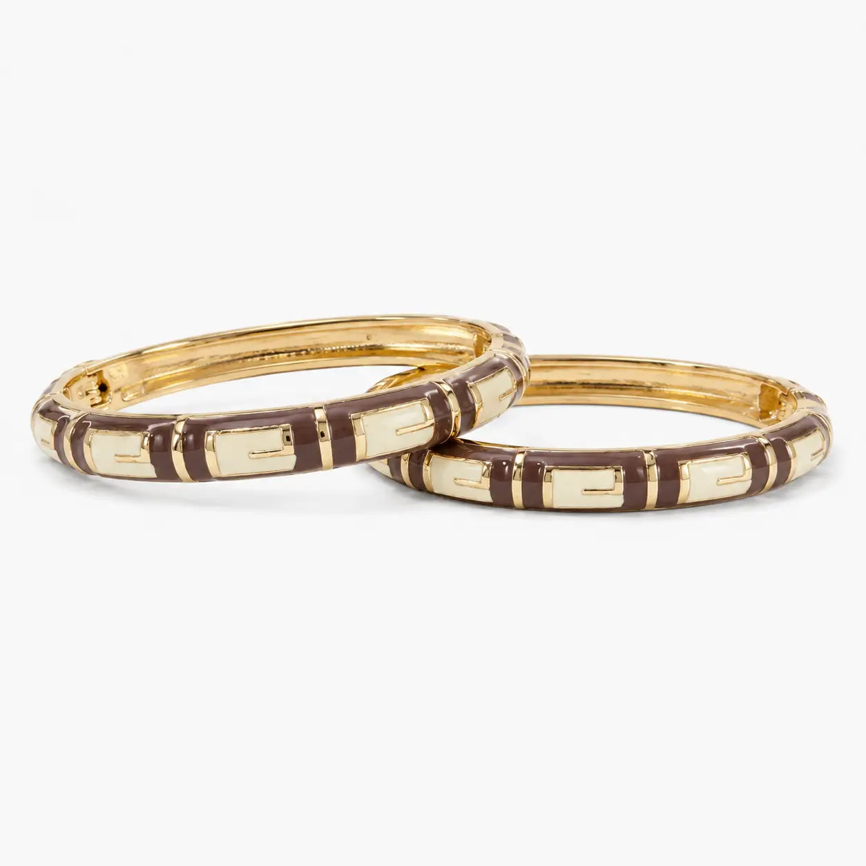 Brown and cream designer bangle set with geometric enamel pattern, angled view
