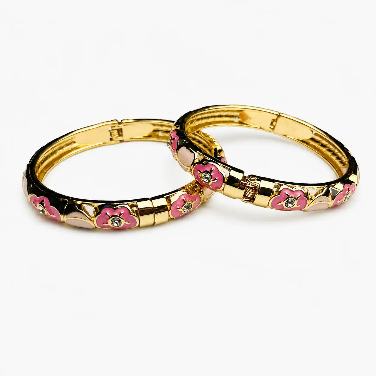 Pink Floral Enamel Bangles Pair With Black Cream And Gold-Tone Details On A White Background