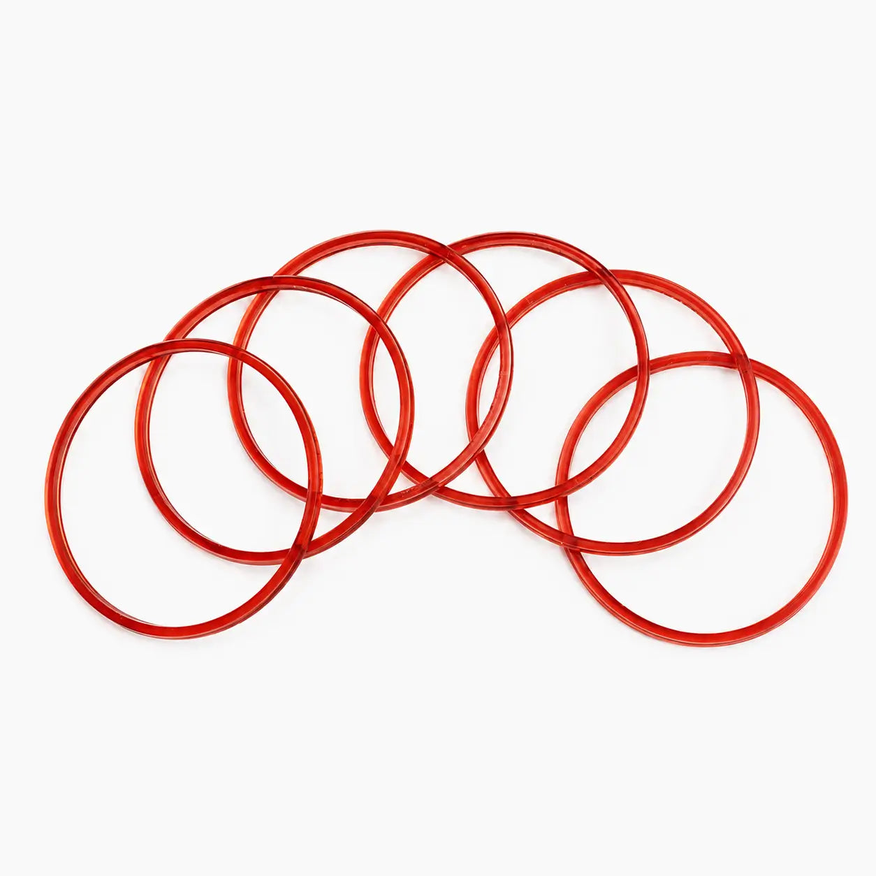 Red Translucent Jelly Bangles Set Of Seven On A White Background