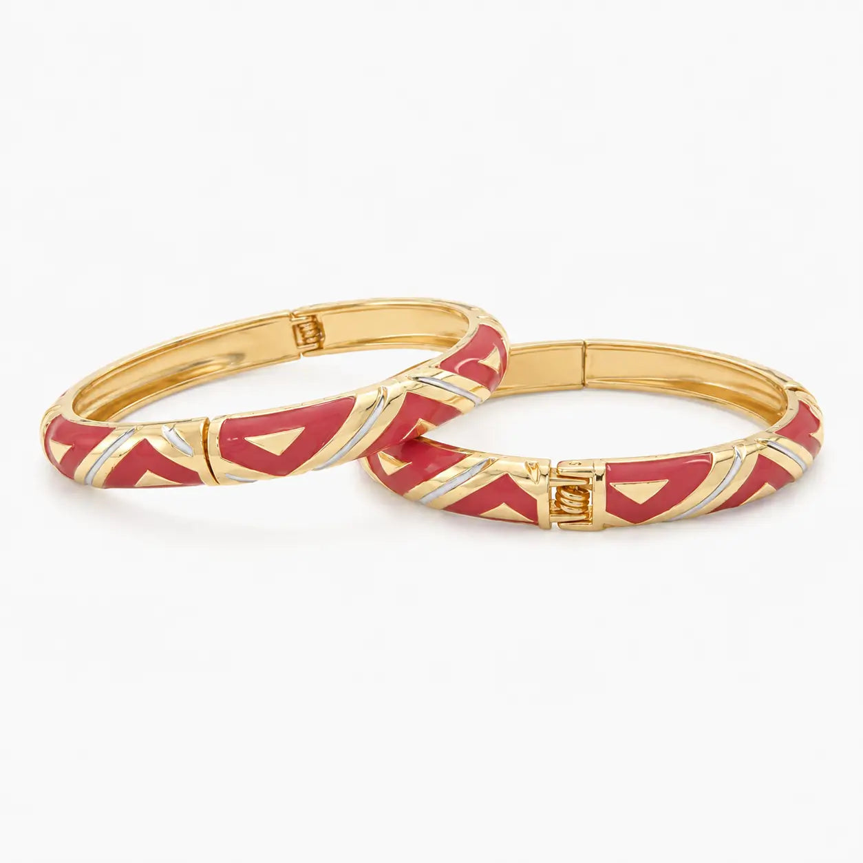 Red chevron bangle set with silver-tone accent stripe, angled view