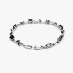 Silver-Tone Dark Blue Tulip Bracelet – Clasp And Vine Detail