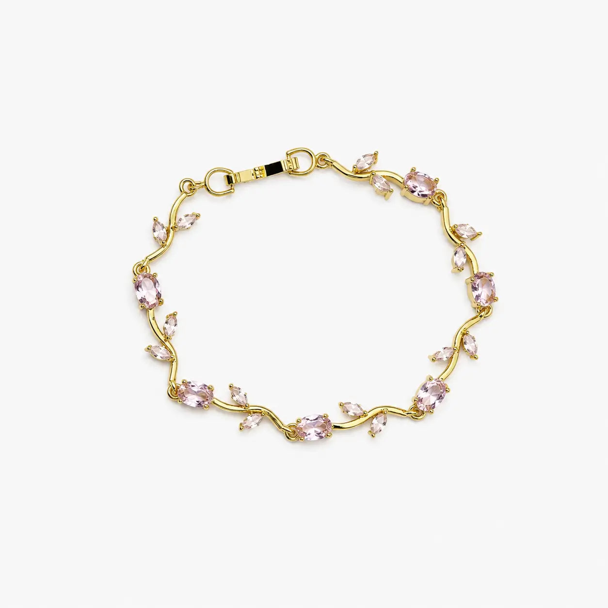 Artificial bracelet for women with pale pink oval and leaf-shaped stones on a polished gold-colour vine design.