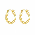 Hoop earrings in polished gold tone with repeated elongated oval bead-like elements around the hoop