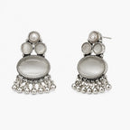 Artificial silver earrings with grey oval stone-look centres, pearl-look tops and dangling bead fringe, angled view