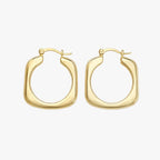 ): Hoop earrings with a gold-tone rounded square design and smooth chunky finish, front view