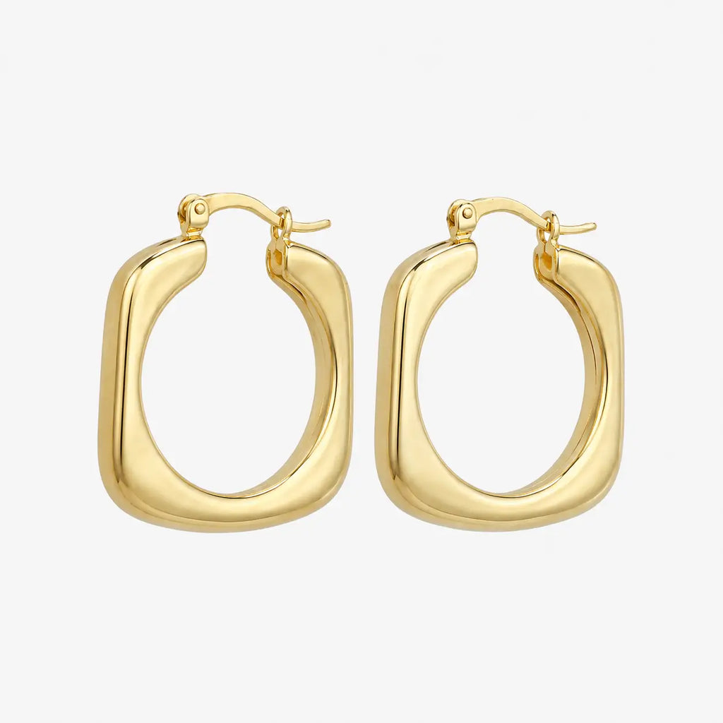 Hoop earrings in a smooth gold-tone rounded square shape with chunky polished profile, angled view