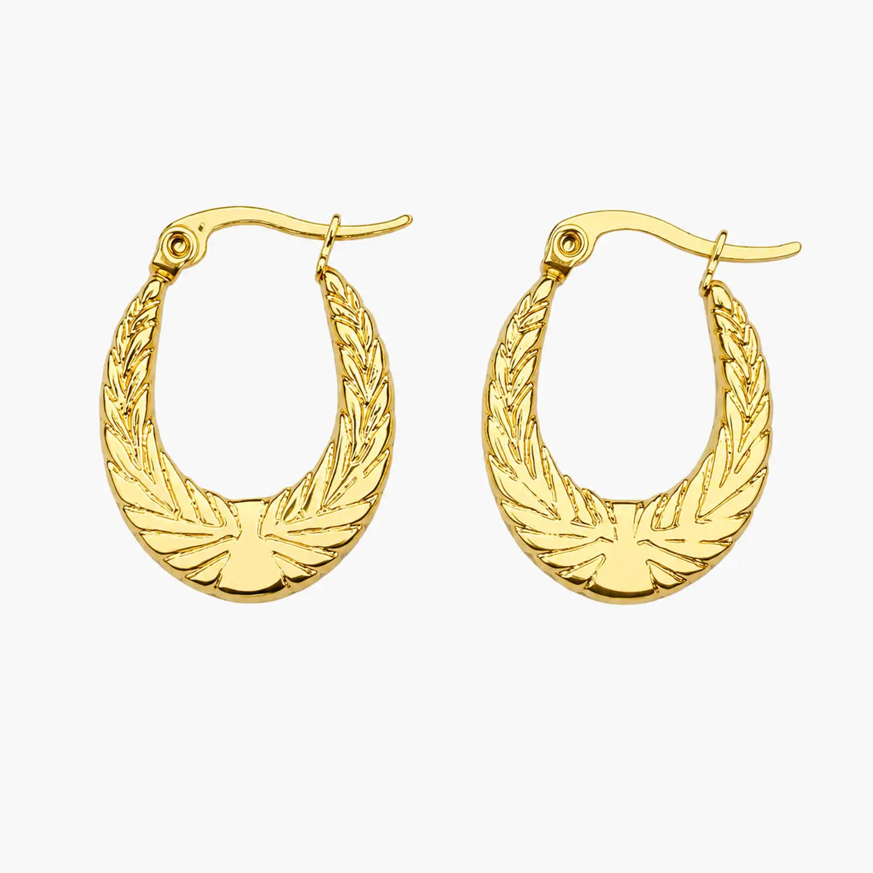 Hoop earrings with gold-tone leaf-inspired engraved pattern and broad oval silhouette, front view