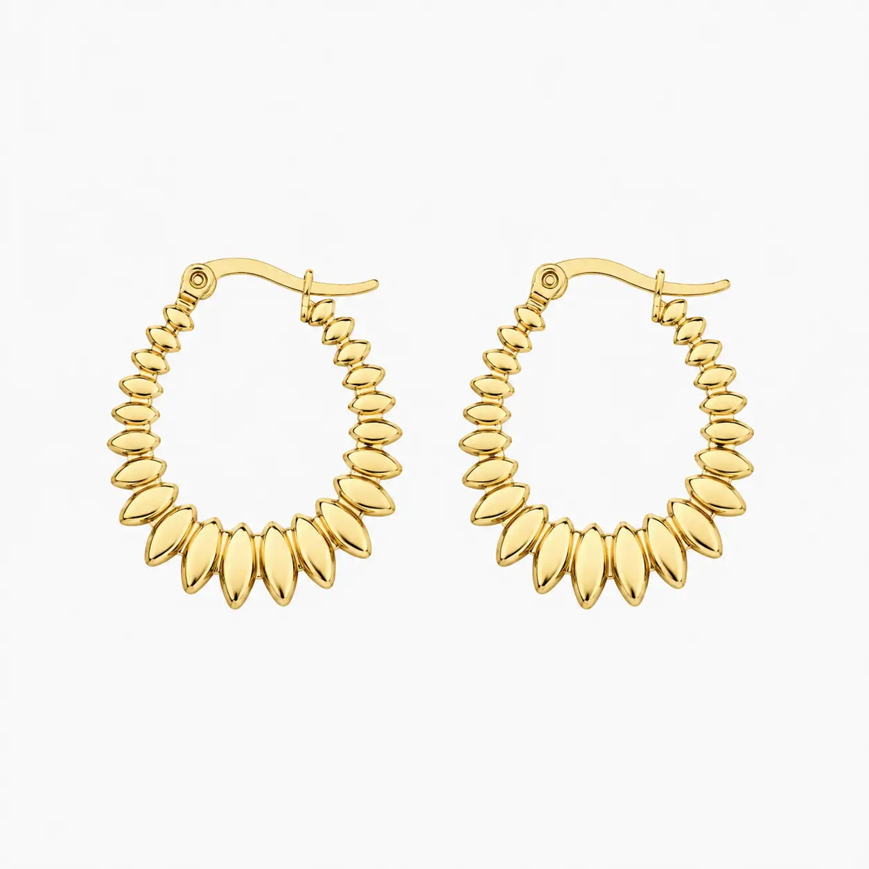 Hoop earrings in gold tone with graduated polished oval bead-like elements, angled view