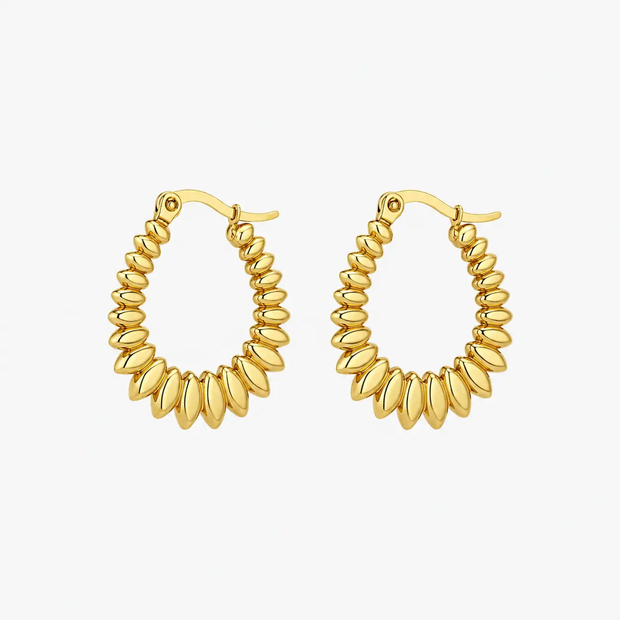 Hoop earrings with gold-tone graduated oval bead-like elements arranged around the full hoop, front view