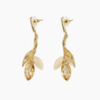 Gold-tone leaf and marquise crystal drop earrings on white background, front view