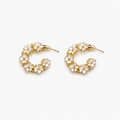 Gold-tone white flower hoop earrings – front view
