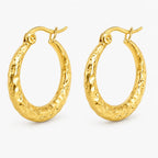 Gold-tone hammered hoop earrings – alternate view
