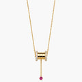 pink bead-drop lariat necklace on fine gold-color chain