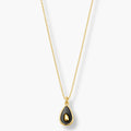 black teardrop pendant necklace on fine gold-color chain - close up