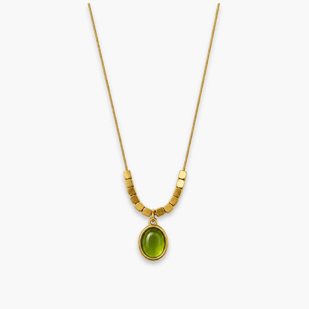 Green oval pendant necklace with bead-and-bar chain accents