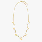 gold-color open-circle accent station necklace