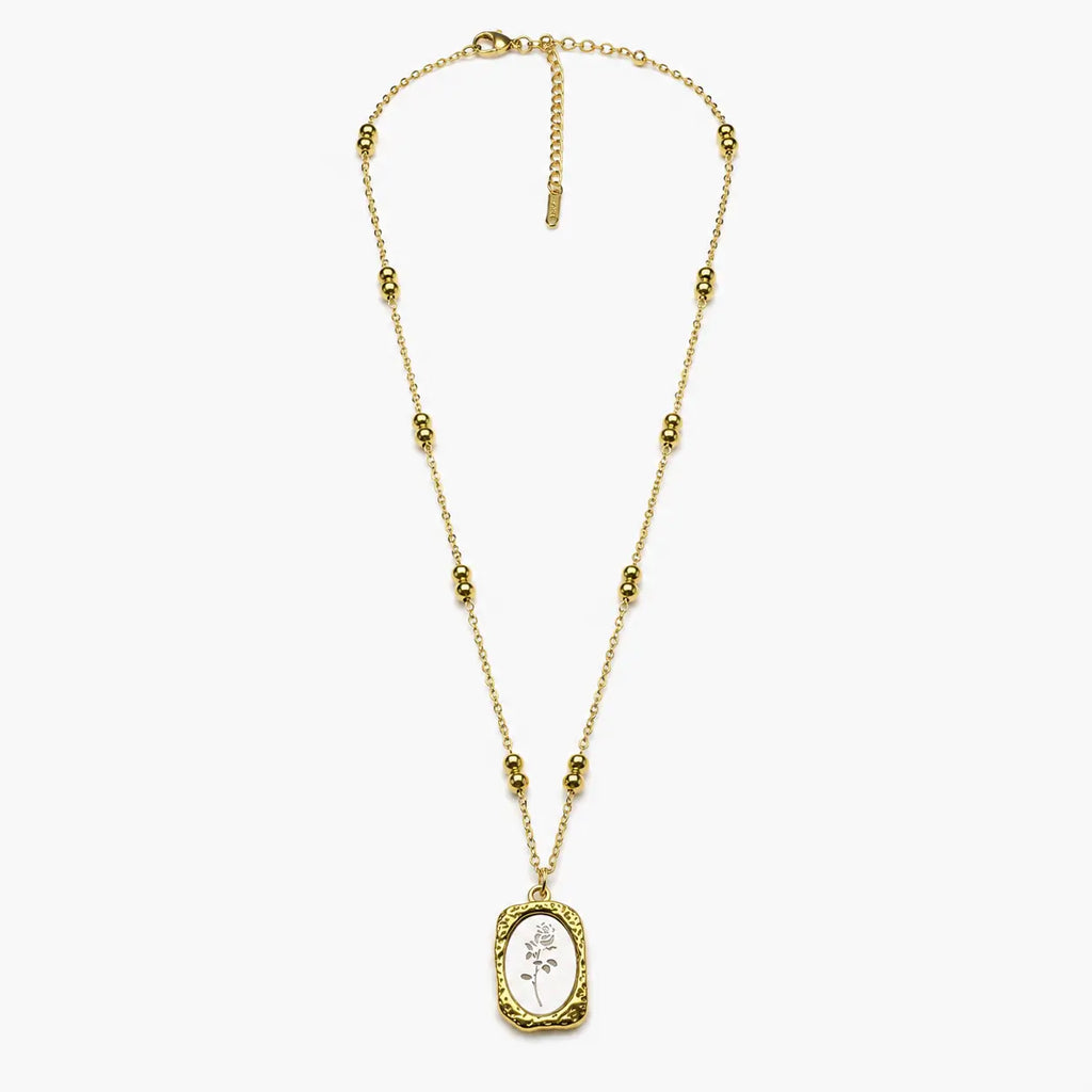 Full view of the two-tone necklace for women with bead stations, rose pendant, clasp and extender chain.