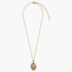 Full view of the gold-tone necklace for women with a pink floral pendant, fine chain, clasp and extender.