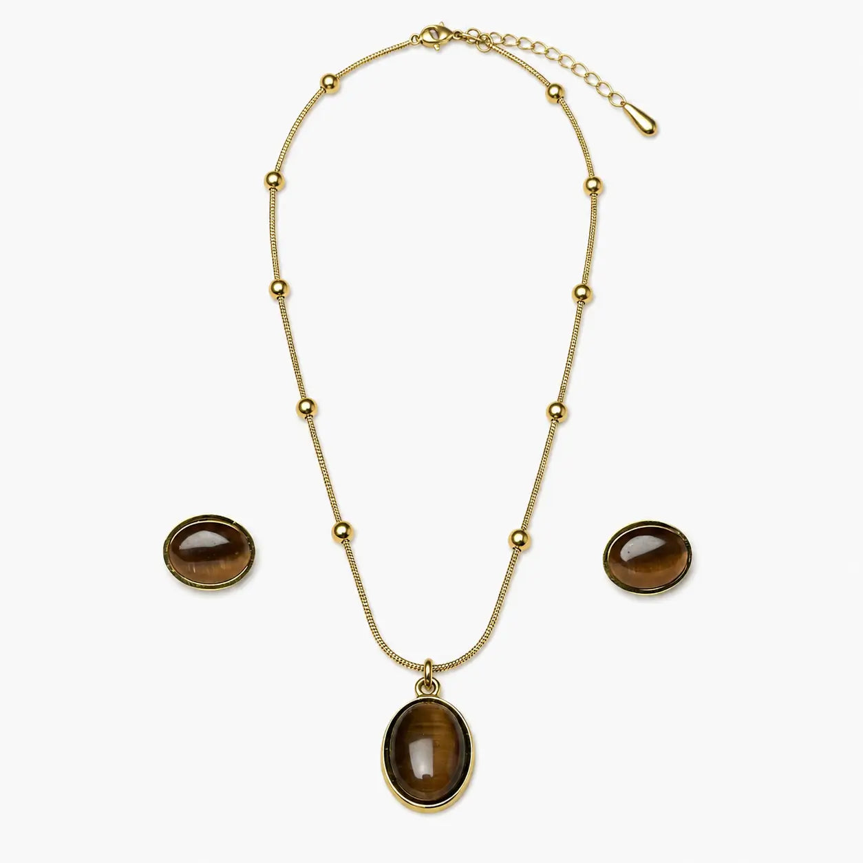 Artificial necklace and earrings set in gold tone with oval brown stone-look pendant, matching earrings and bead-accent chain