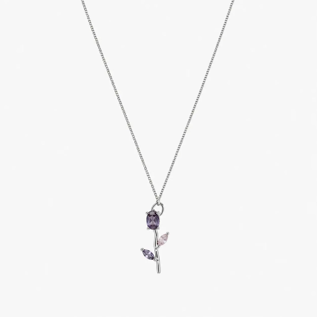 Close-up of purple and pink crystal tulip pendant on fine silver-tone chain