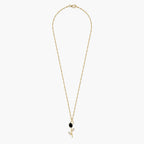 Gold-tone black crystal tulip pendant necklace on white background, full chain view