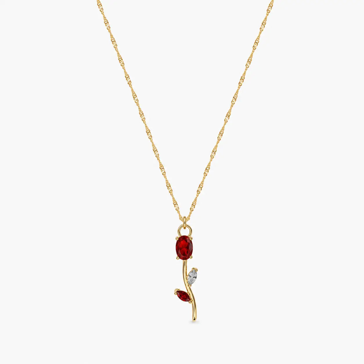 Close-up of red crystal tulip pendant with marquise leaf details on gold-tone chain