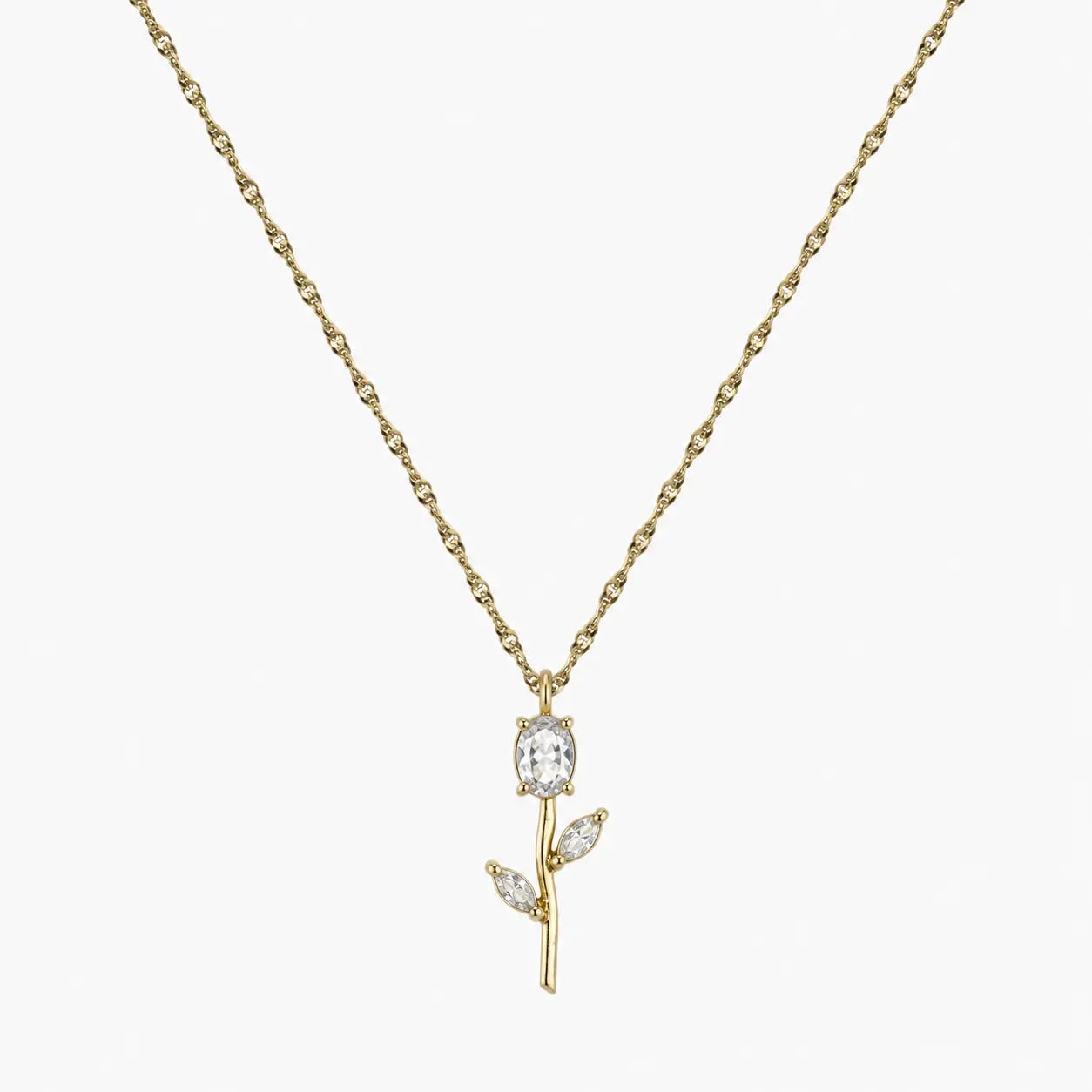 Close-up of clear crystal tulip pendant with marquise leaf details on gold-tone chain