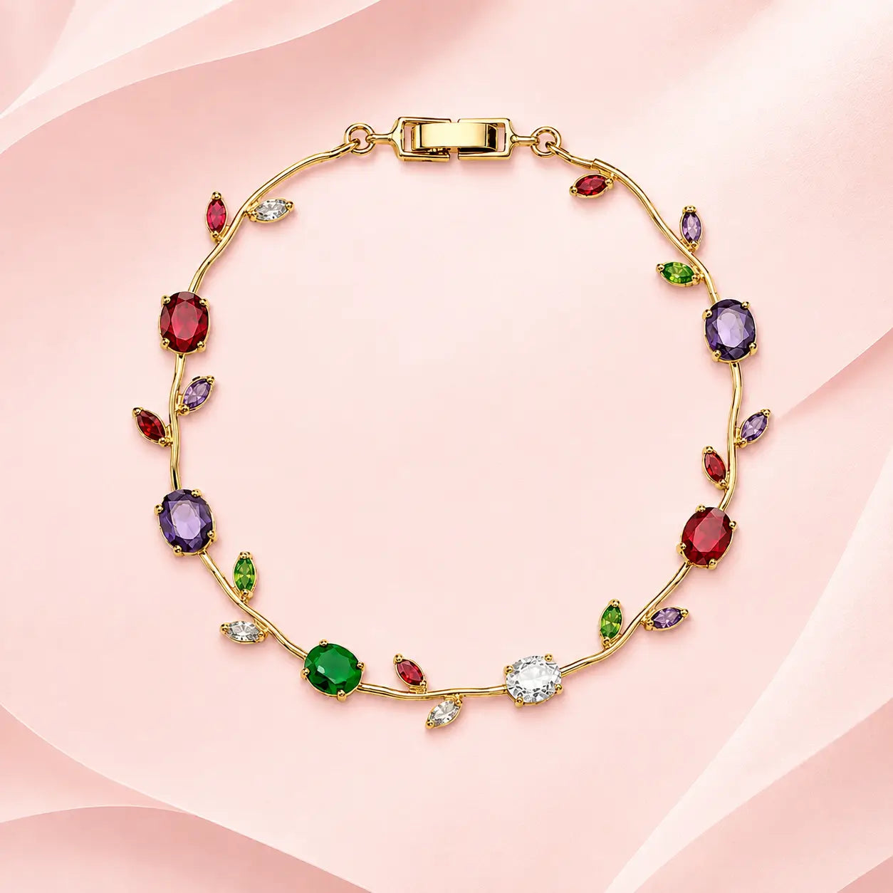 Gold-tone artificial bracelet with multi-color oval and marquise stone details